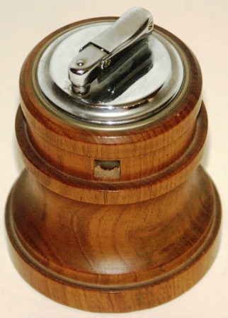 20th century cigarette lighter mounted on wooden capstan