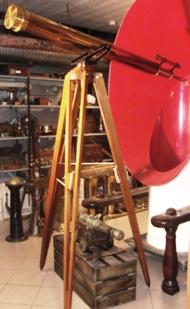 Late 19th century large brass telescope, mounted on three-legged mahogany floor stand. Made by Broadhurst Clarkson & Co., 63 Ferringdon Rd, London EC.