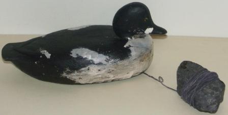 Original early 20th century decoy from the Baltic Sea. Incl stone-weight. 