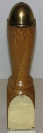 Mid 20th century trophy made out of a spoke from a ships wheel. Oak and brass. 