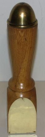 Mid 20th century trophy made out of a spoke from a ships wheel. Oak and brass.