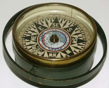 19th century dry compass. Brass, mounted in gimbals. Made by Iver C. Weilbach & Co.