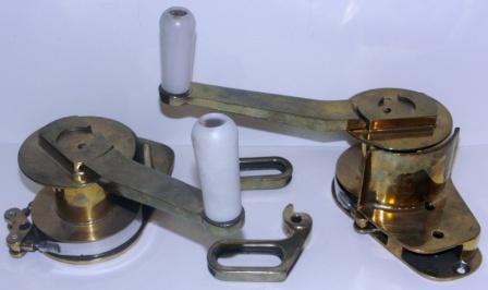 A pair of 20th century sailboat winches, made of brass.