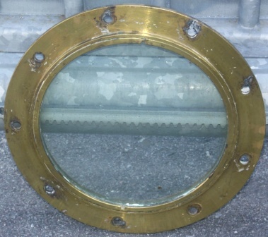 20th century fixed porthole made of brass
