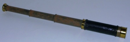 Late 19th century hand-held refracting telescope, maker unknown. With three brass draws and leather bound tube. 