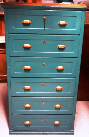 Cabinet with 6 drawers in painted metal/brass handles from the Swedish Navy' battleship HMS Sverige, launched 1915. Used in a noncommissioned officer's (NCO) cabin.