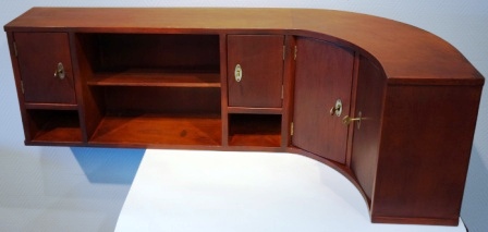 Wall-mounted mahogany corner cupboard (90 degrees) from M/S Bärenstein-Bremen, Norddeutscher Lloyd. Detachable shelves. 