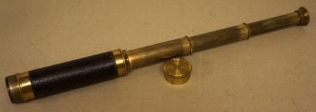 Late 19th century hand-held refracting telescope, maker unknown. With three brass draws and leather bound tube. 