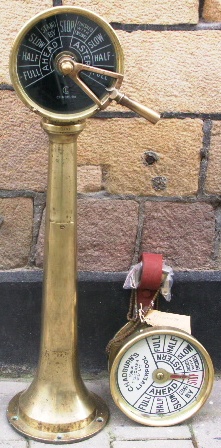 A pair of early 20th century one-sided ship`s telegraphs off the vessel Viscountess, containing both the bridge and the engine room telegraph with connecting chains. Made by Chadburn`s Ship Telegraph Co. Ltd., Liverpool. 