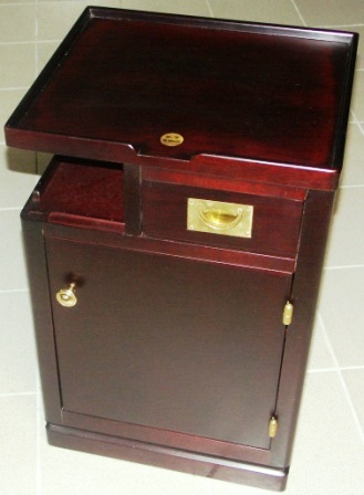 A pair of 1950’s bedside cabinets in mahogany and brass from the Italian liner M/N G. Verdi. Left and right hung compartment, door and drawer.