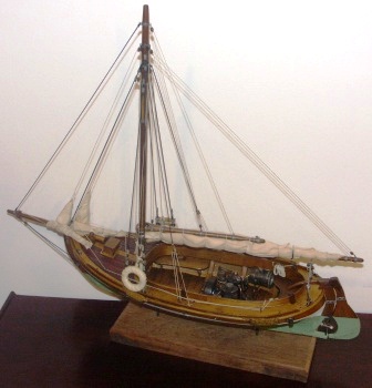 20th century clinker-built and gaff sail-rigged open coaster type model equipped with compression-ignition engine.