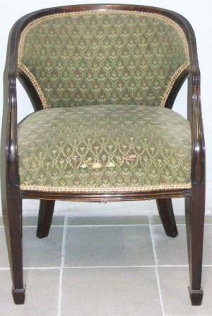 Mahogany armchair with original fabric from the passenger ship Berengaria, built 1913 at Vulkan Werke, Hamburg, Germany.