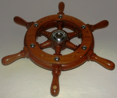 Mid 20th century six-spoked teak steering wheel. 