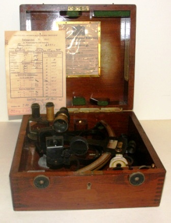 Sextant dated 1939 made by H. Hughes & Son Ltd., London. No 22971. Supplied by Ingenioreoraetningen Atlas A/S Oslo. Last examined and adjusted in April 1957 by Deutsches Hydrographisches Institut, Hamburg. Brass circle frame, silver scale, four telescopes and two sun-filters. In original mahogany case.